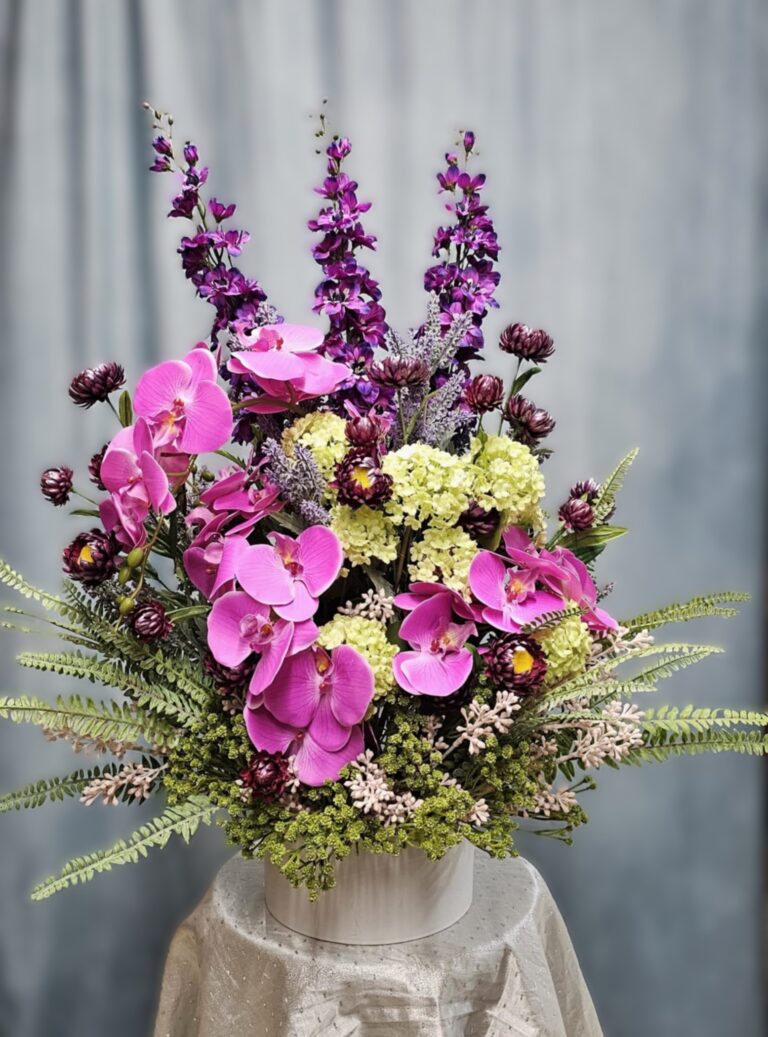 Hand Made Faux Arrangement with Orchid's and misc. Silk Florals